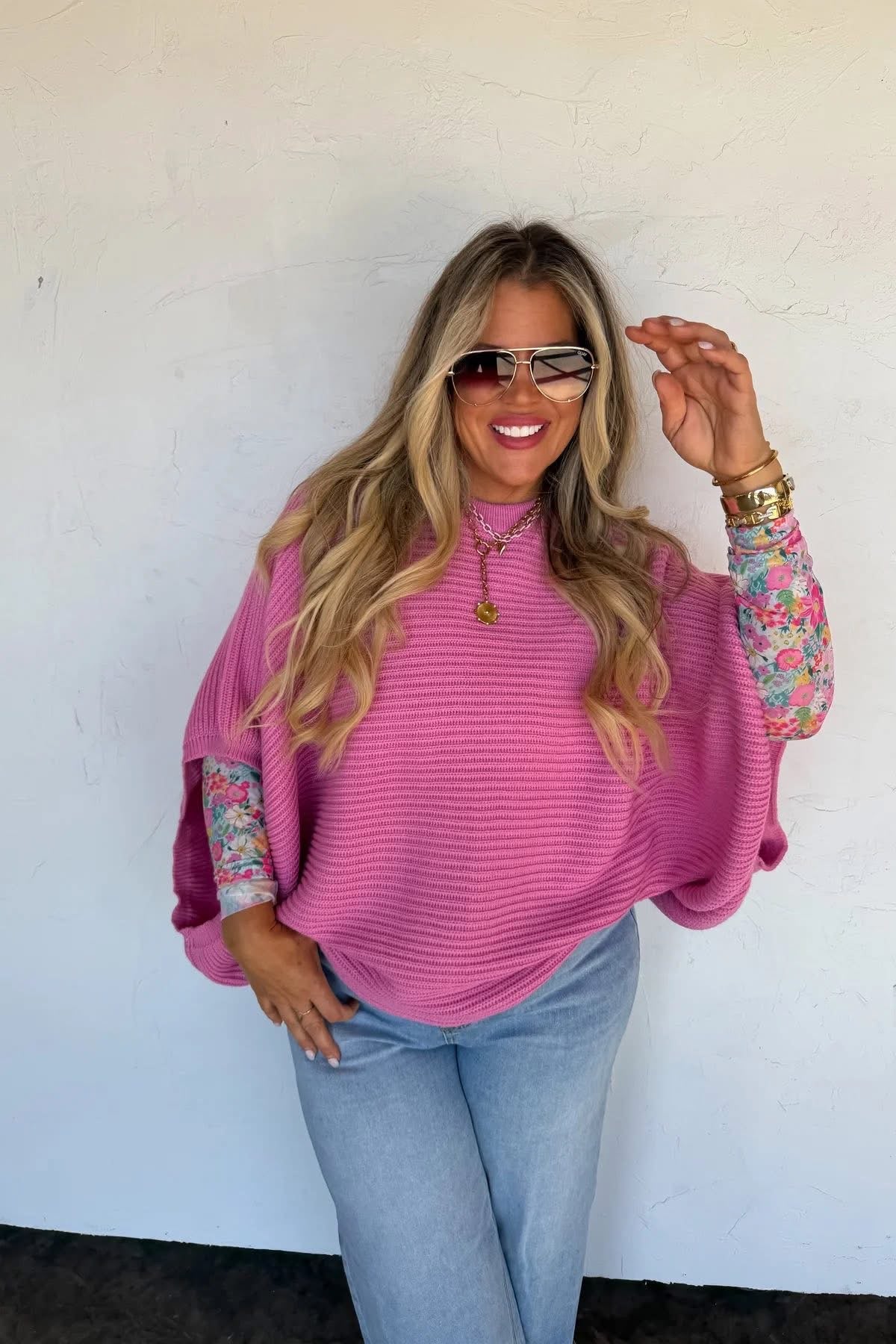 Pink sweater poncho