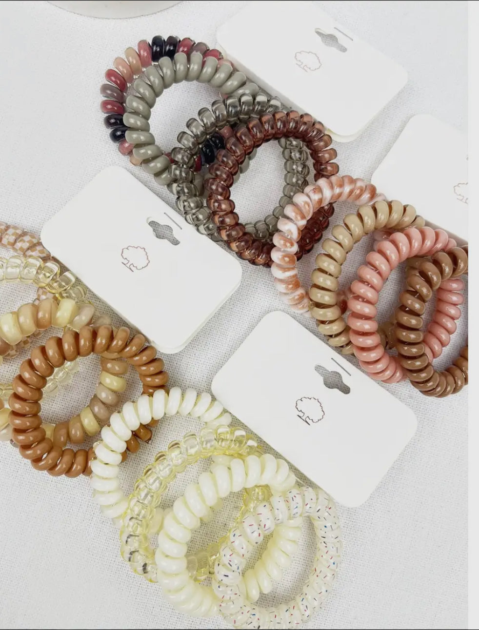 Neutral spiral hair ties