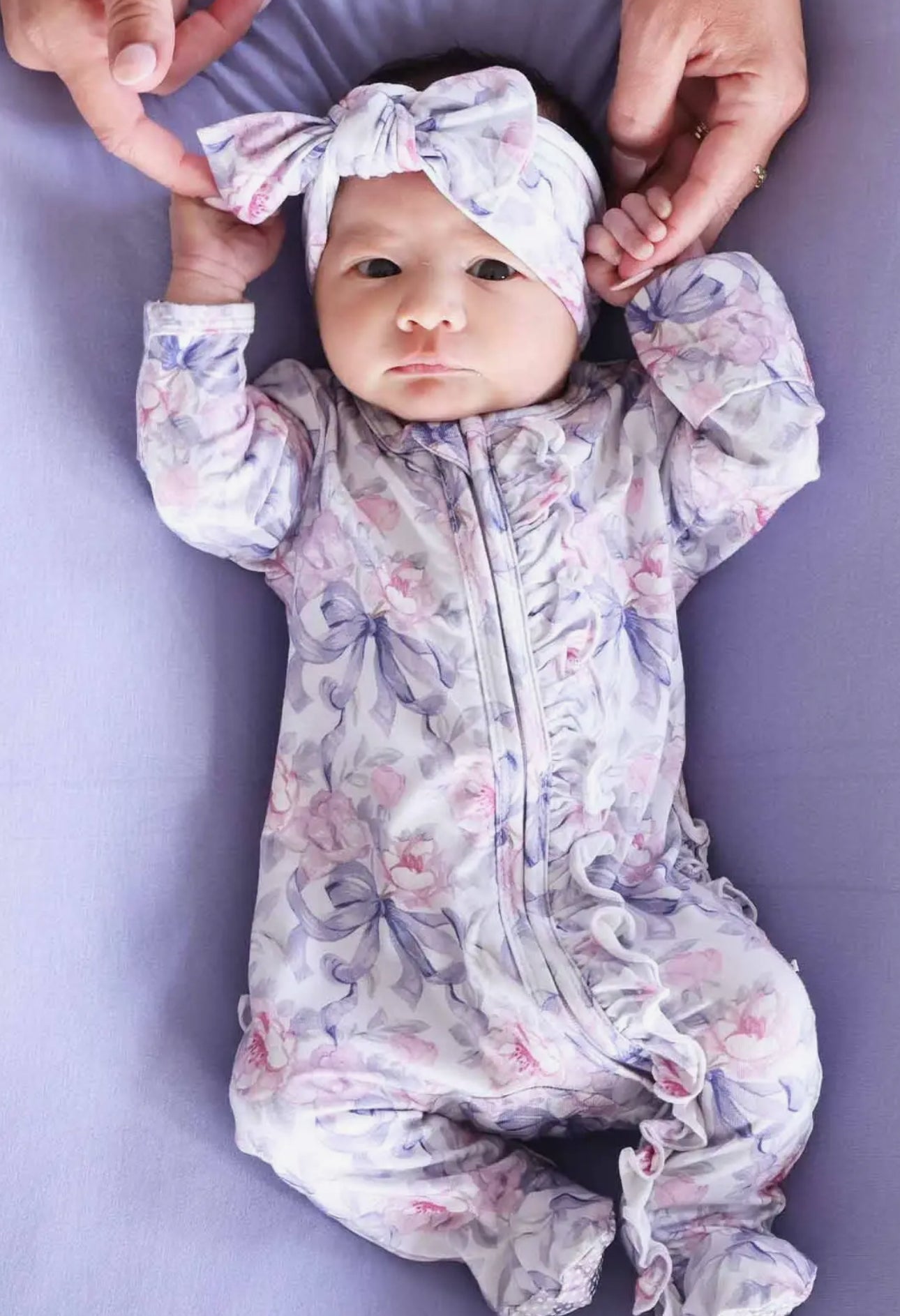 Leighton’s lavender Ruffle bamboo footie