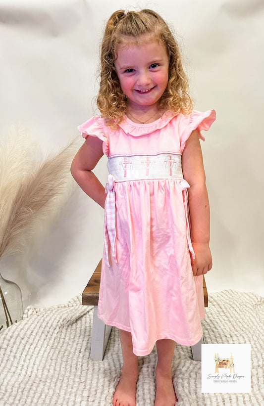 Pink cross smocked girls dress
