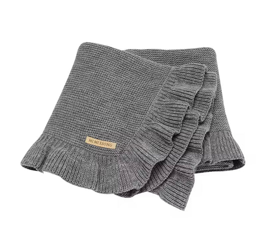 Grey ruffle blanket