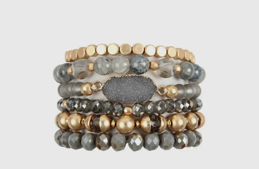 Grey charm bracelet stack