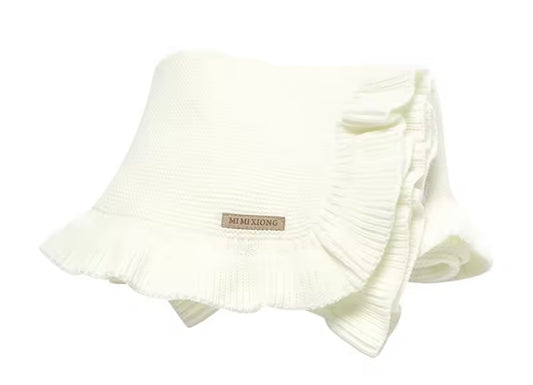 White ruffle blanket