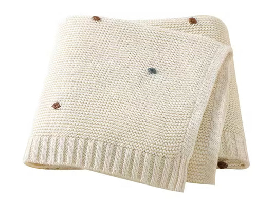 Cream polka dot knit blanket