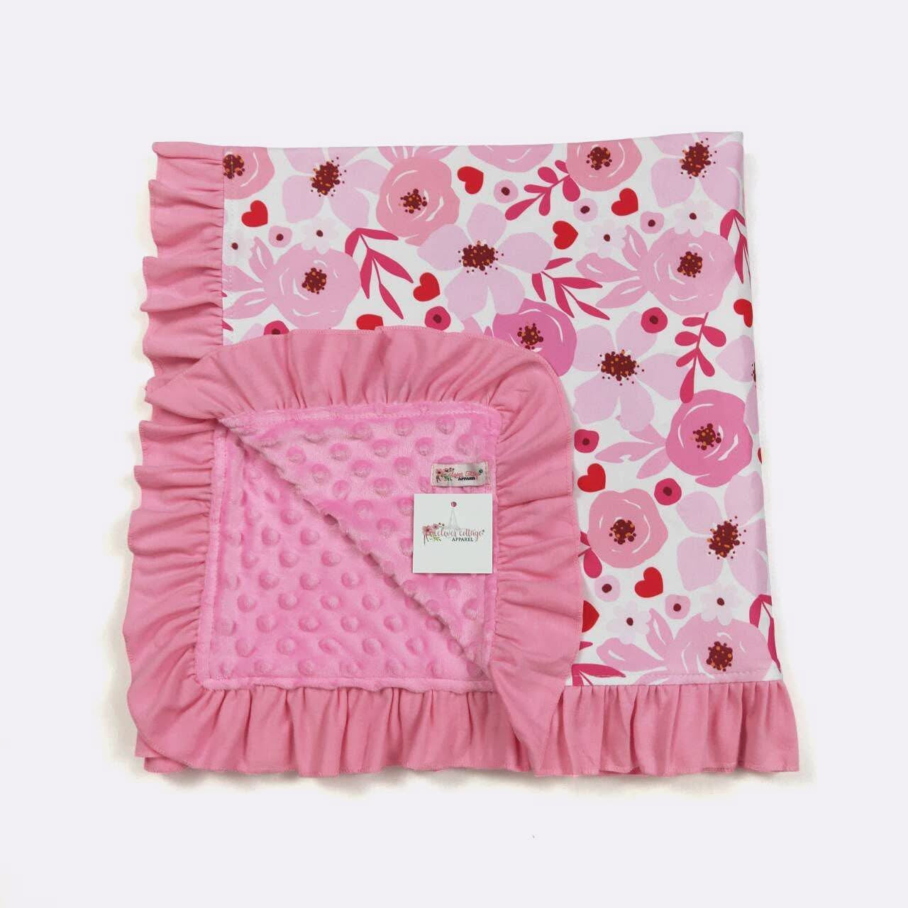 Pink floral ruffle lined blanket
