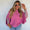 Pink sweater poncho