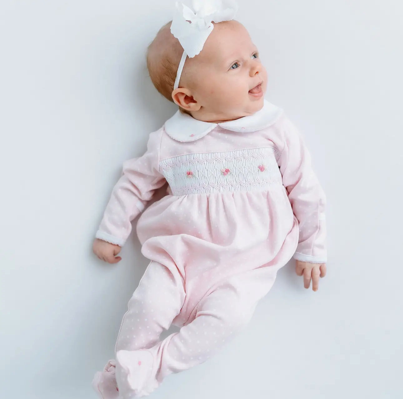 Mia’s classic smocked footie