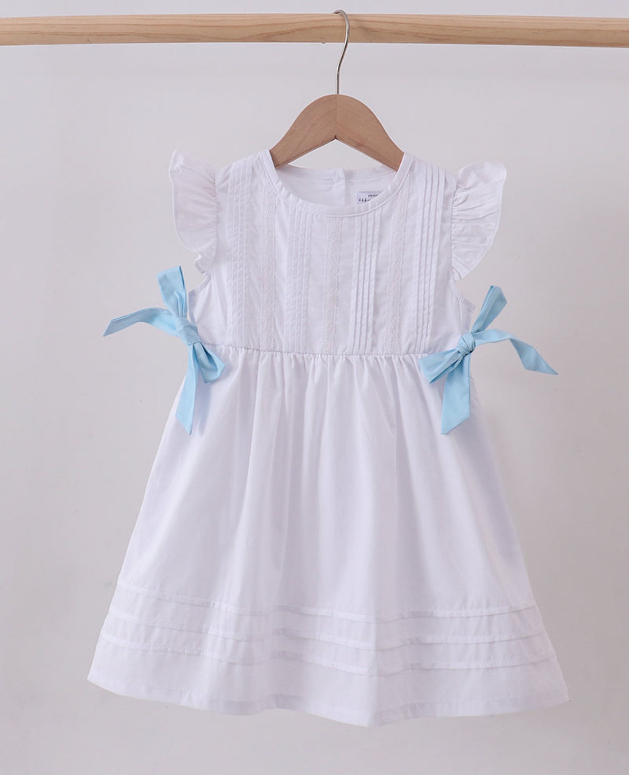 Blue bow ruffle dress
