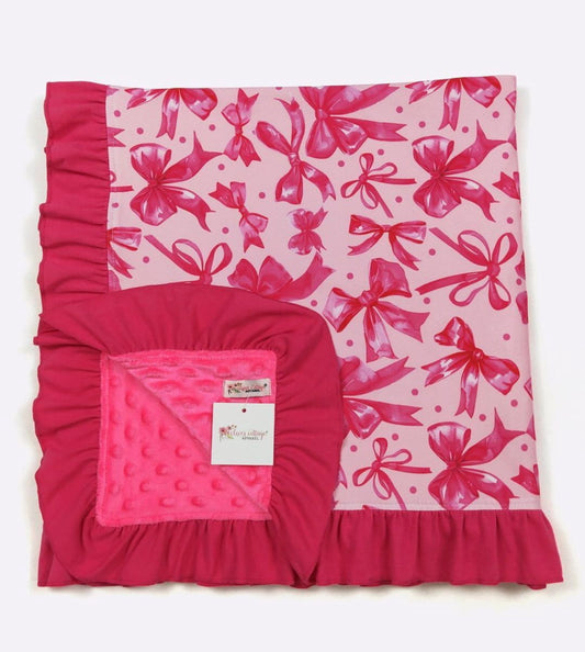 Pink bows ruffle lined blanket