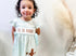 Embroidered he is risen girls dress