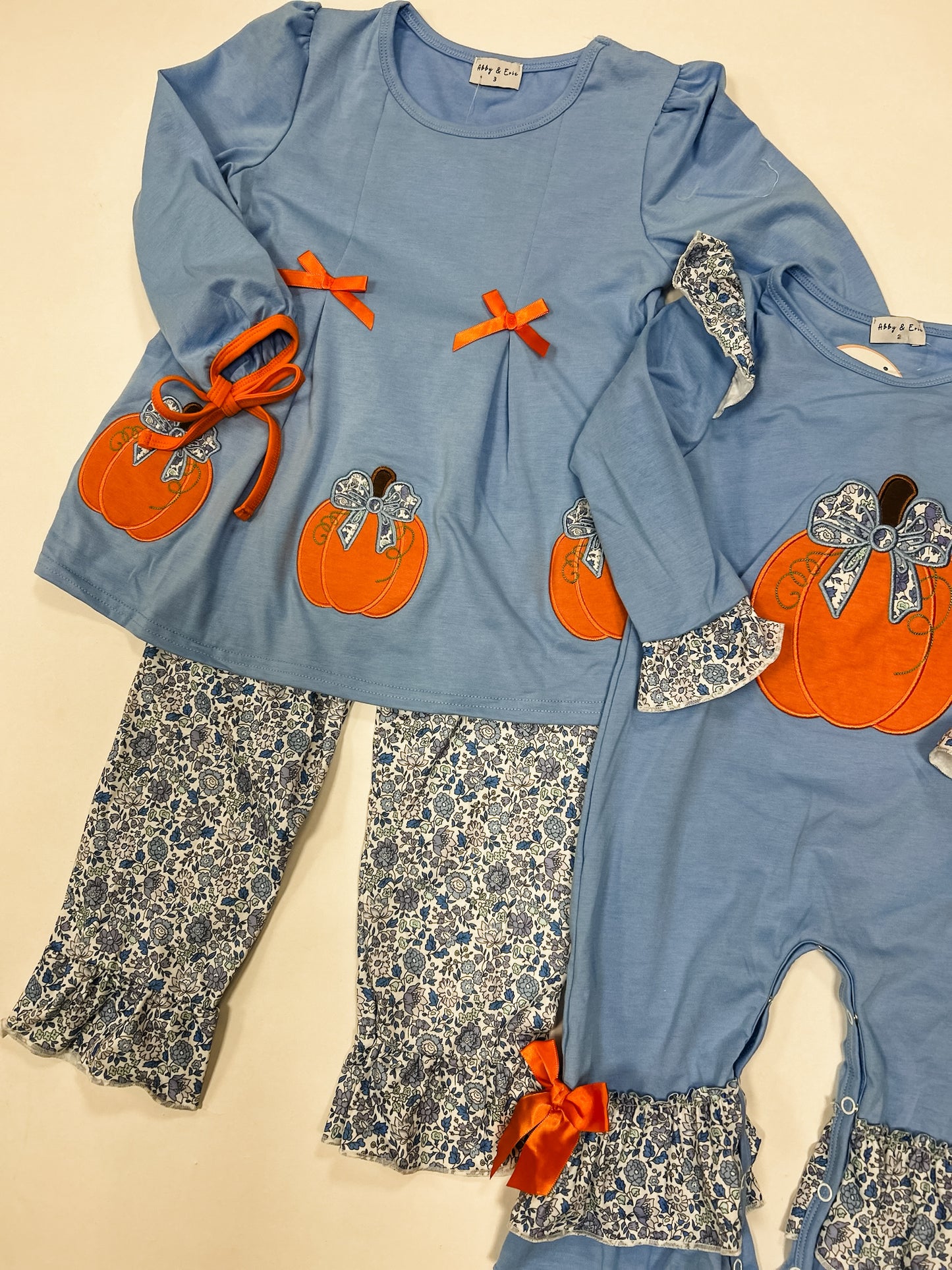 Blue pumpkin floral romper