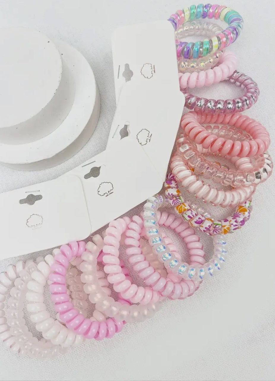 Pink spiral hair tie