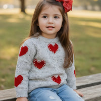 Pearl snapped heart sweater