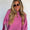 Pink sweater poncho