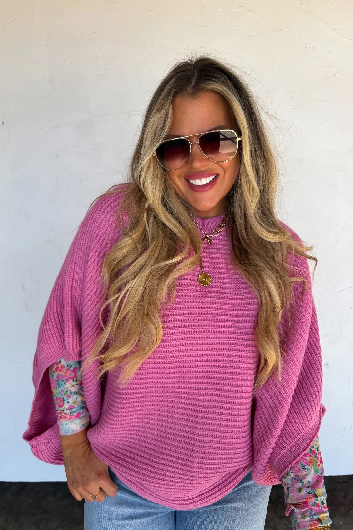 Pink sweater poncho