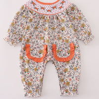 Floral smocked romper