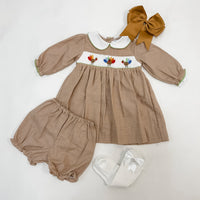 Smocked turkey gingham dress