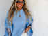 Blue sweater poncho