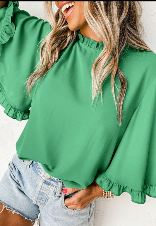 Green frilly blouse