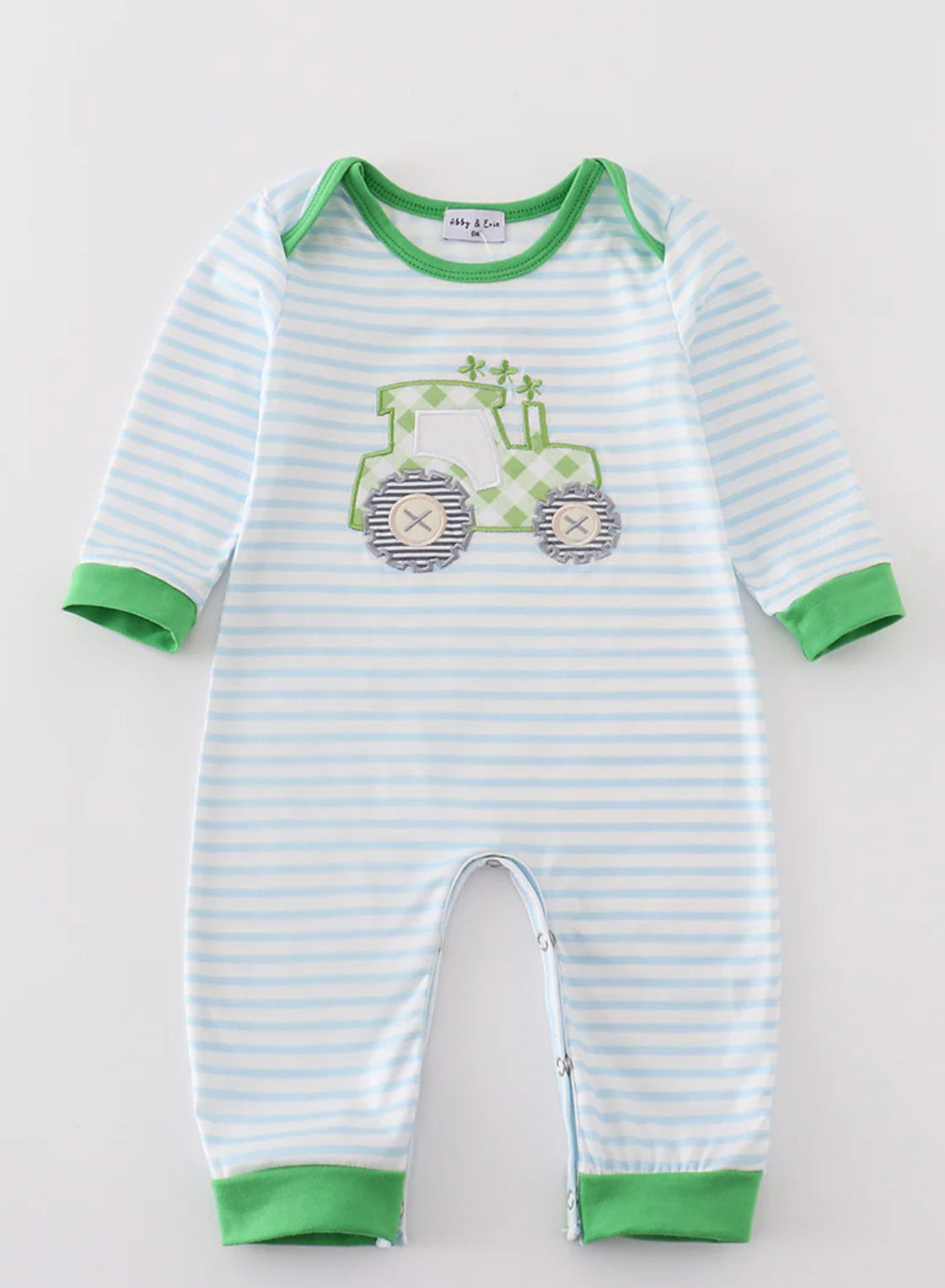 Green tractor clover romper