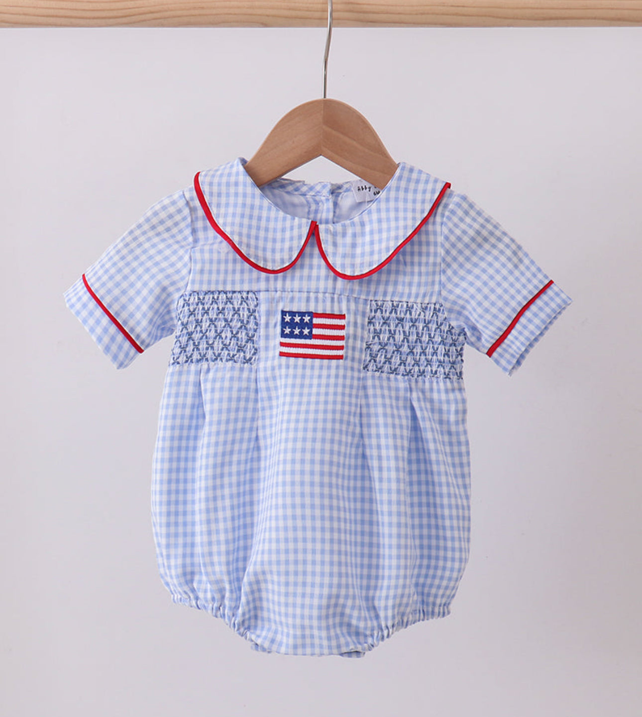 Blue flag smocked bubble