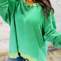 Ribbed green raw hem top
