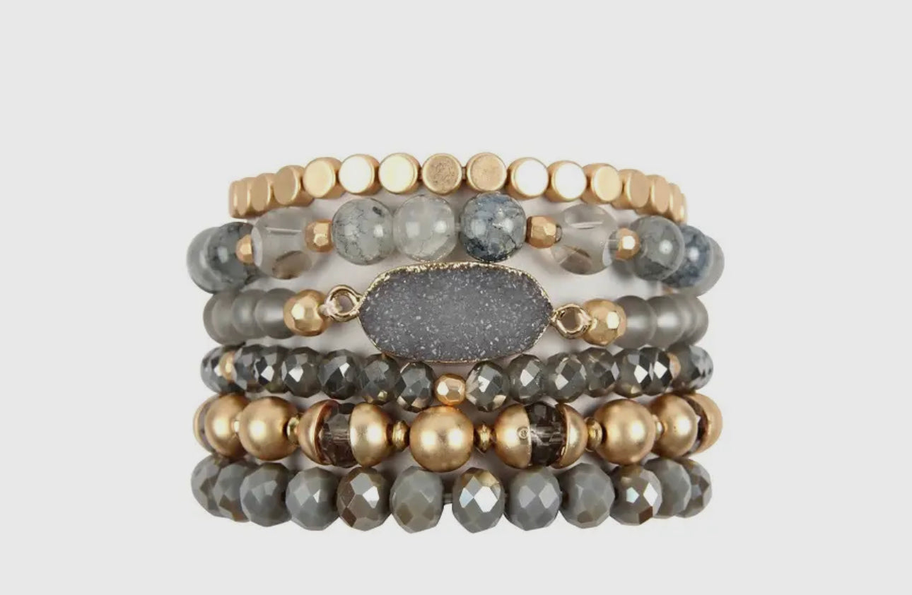 Grey charm bracelet stack