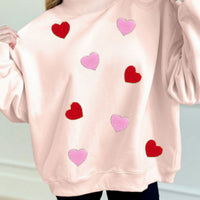 Pink heart mock neck sweater