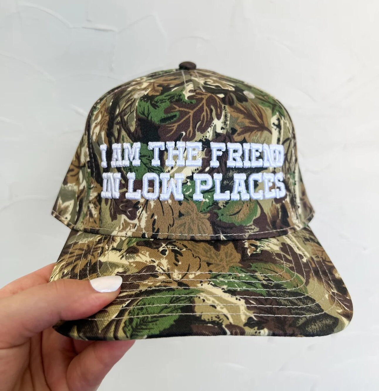 I am the friend in low places trucker hat