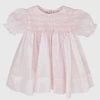 Pink smocked dress with lace