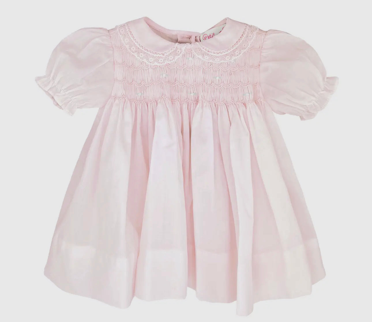 Pink smocked dress with lace