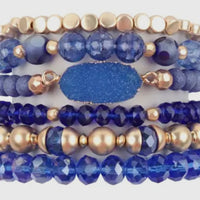 Blue charm bracelet stack