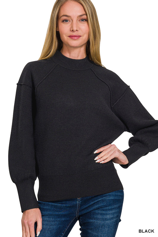 Mock neck exposed seam sweater- black