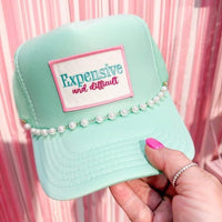 Expensive & difficult trucker hat