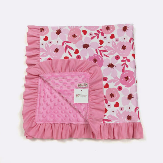Pink floral ruffle lined blanket