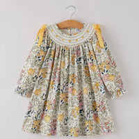 Smocked yellow floral dress