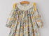 Smocked yellow floral dress