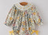 Smocked yellow floral bubble