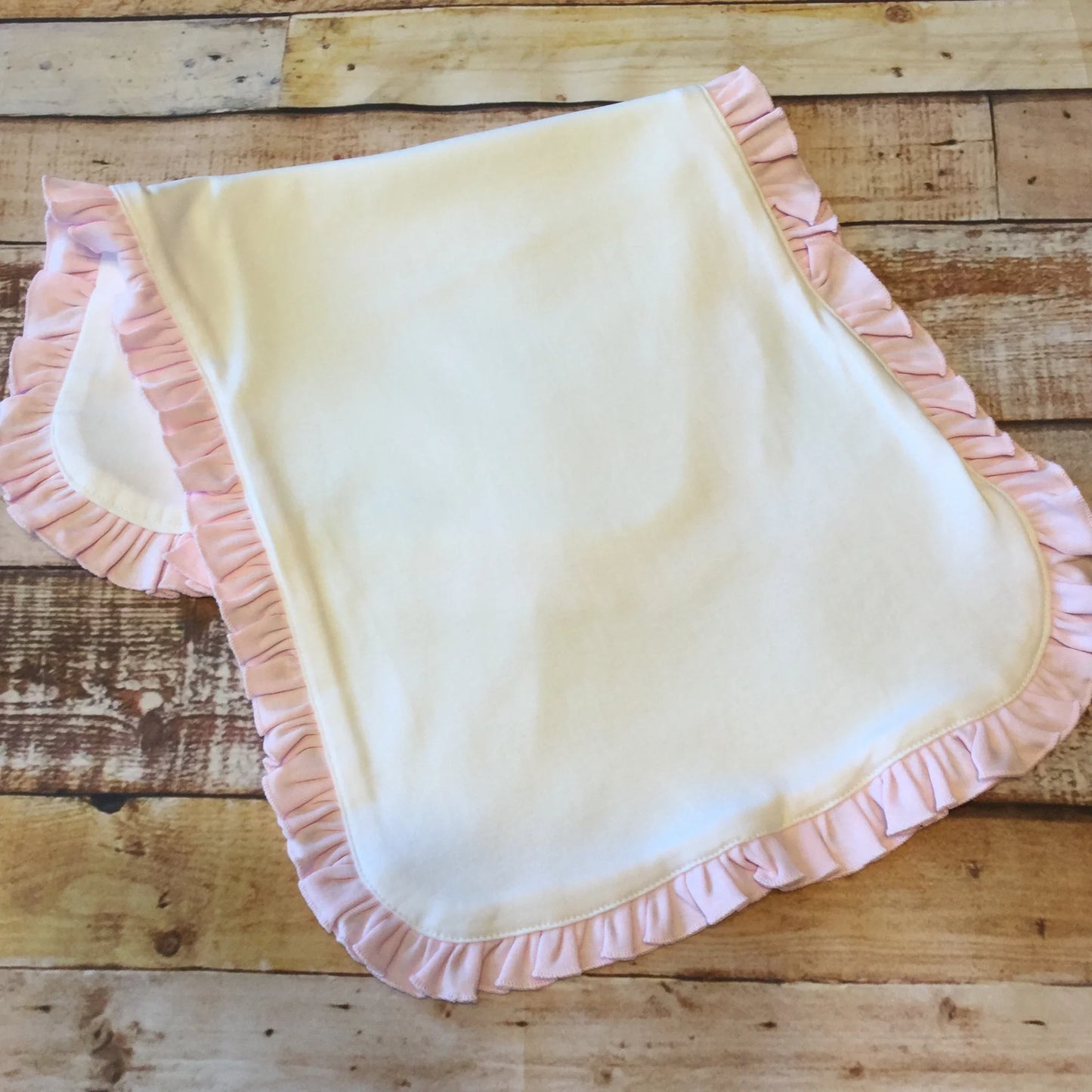 Pink ruffle burp cloth